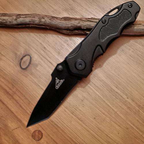 The belt clip and key ring holder make it easy to carry. The full steel structure and solid liner lock make the knife strong. Easy one hand opening is made possible with the dual sided thumb stud. A nylon pouch is included.