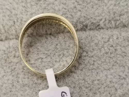 Detailed Gold Ring With Diamonds