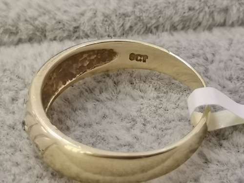 Detailed Gold Ring With Diamonds