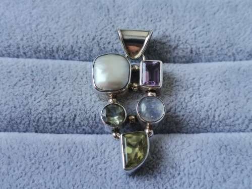 Discount!! Unique Pearl, Peridot, Moonstone and Amethyst Pendant