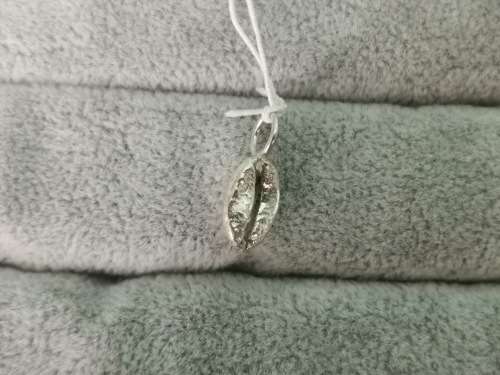 **R1 Auction** Silver Coffee Bean Pendant