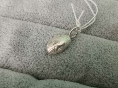 **R1 Auction** Silver Coffee Bean Pendant