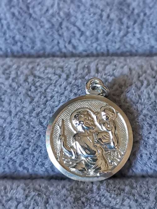 **R1 Auction**  Silver St. Christopher Pendant
