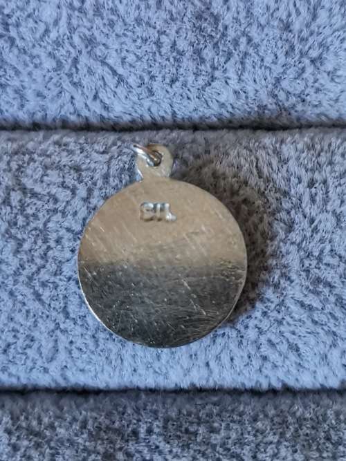 **R1 Auction**  Silver St. Christopher Pendant