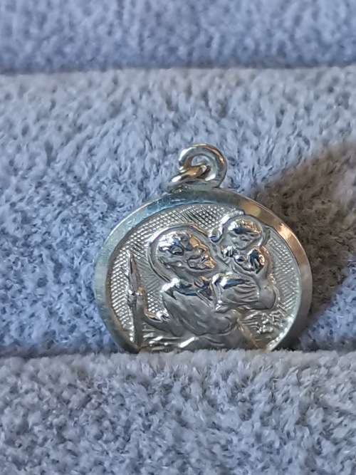 **R1 Auction**  Silver St. Christopher Pendant