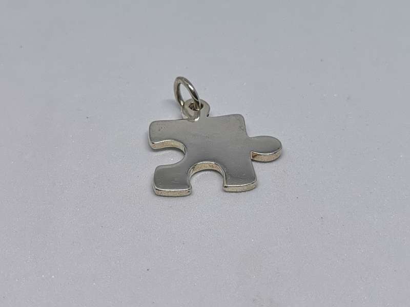 Silver Puzzle Piece Pendant