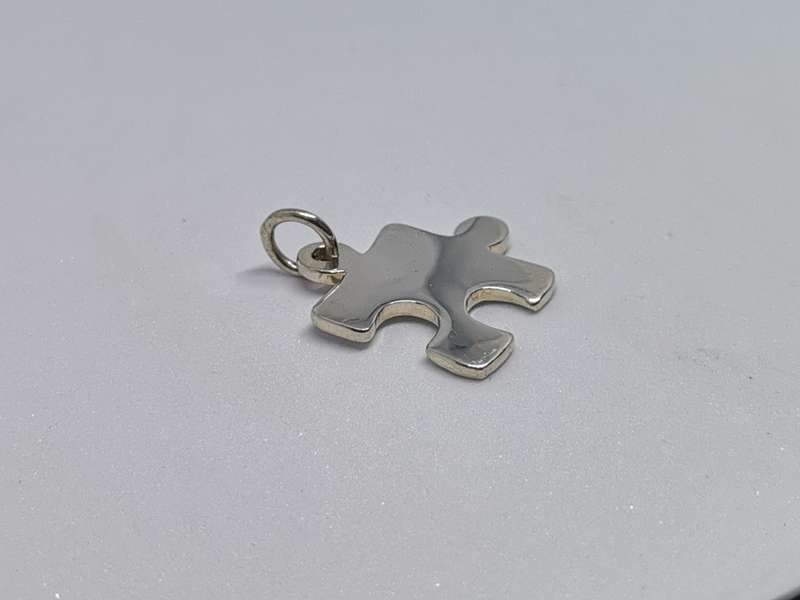 Silver Puzzle Piece Pendant