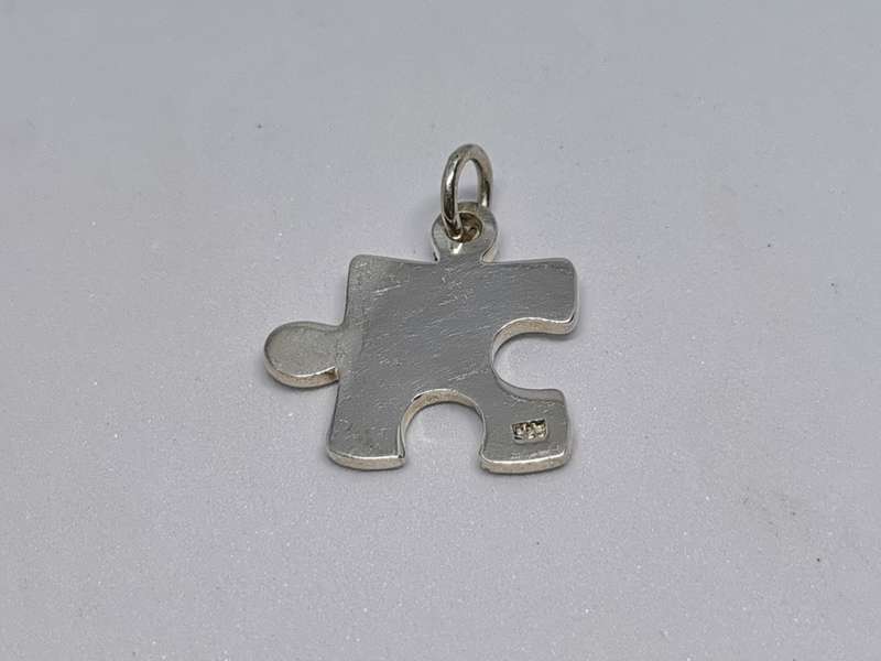 Silver Puzzle Piece Pendant