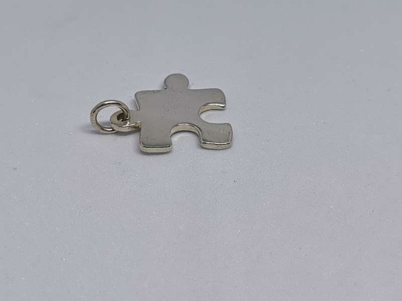 Silver Puzzle Piece Pendant