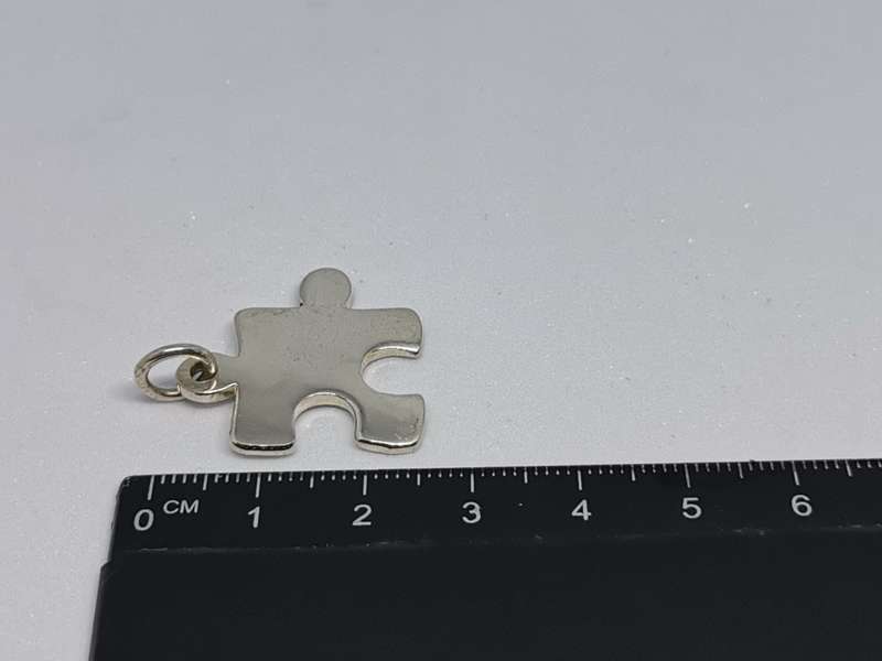 Silver Puzzle Piece Pendant