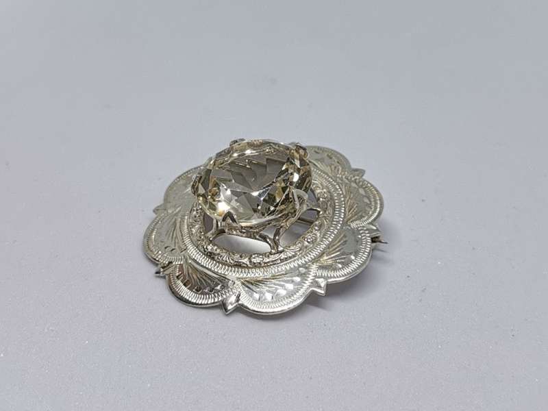 Dazzling Silver Brooch