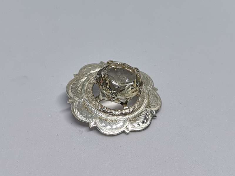 Dazzling Silver Brooch