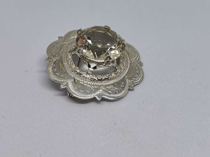 Dazzling Silver Brooch