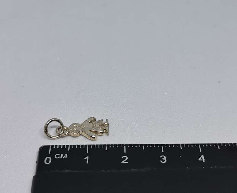 Silver Figure Charm