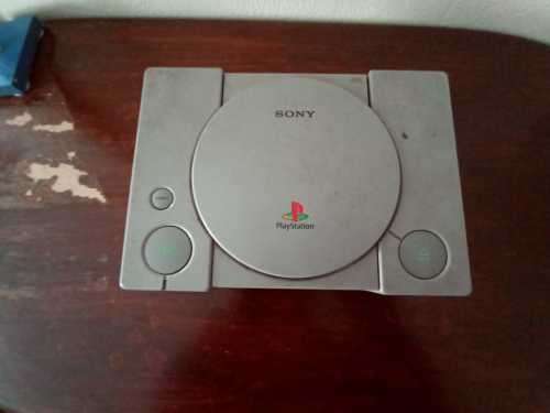 Old PS1 console with cables and 2 games(not tested)