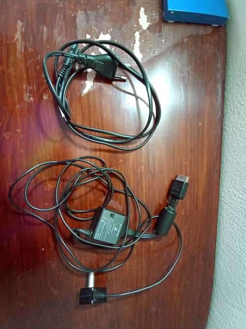 Old PS1 console with cables and 2 games(not tested)