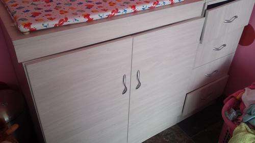 Baby bathing cupboard with changing matt