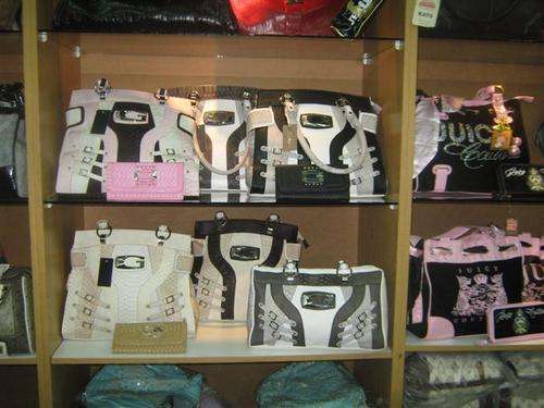 Special;100 % Guess Handbags. Buy one and choose a wallet for free. Hurry while stock last!!!