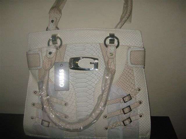 Bid now and pay by the 30th of April 2011. 100 % Guess Handbags