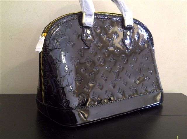 100 % LOUIS VUITTON