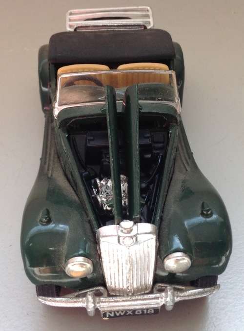 Dark green Corgi MG-TF Made in Great Britain 11.5 cms see all pics Postage R50.