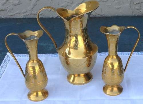3 Brass jugs Indian in good condition Postage R50 We can combine items  Bid for the lot