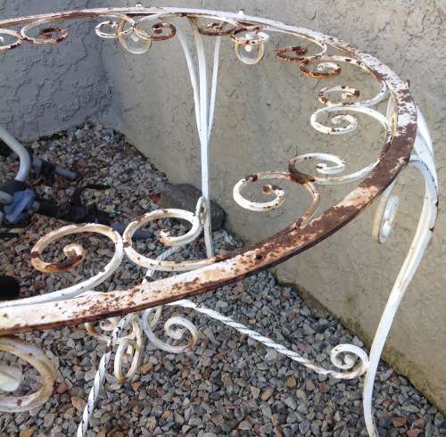 DISTRESSED ROUND WROUGHT IRON  NEEDS TLC AND GLASS TOP.