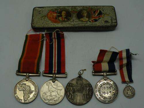 Collection of 5 WW II service medals in a tin