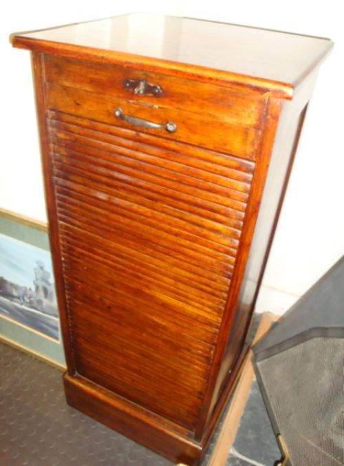Roll Front Oak Fling Cabinet