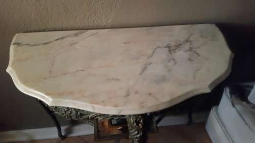 brass and marble half moon table