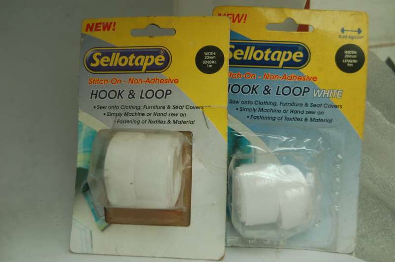 A PAIR (2) -SELLOTAPE HOOK AND LOOP LABEL TAPE. IT NEEDS TO BE SEWN 0N IT IS NOT SELF ADHESIVE.