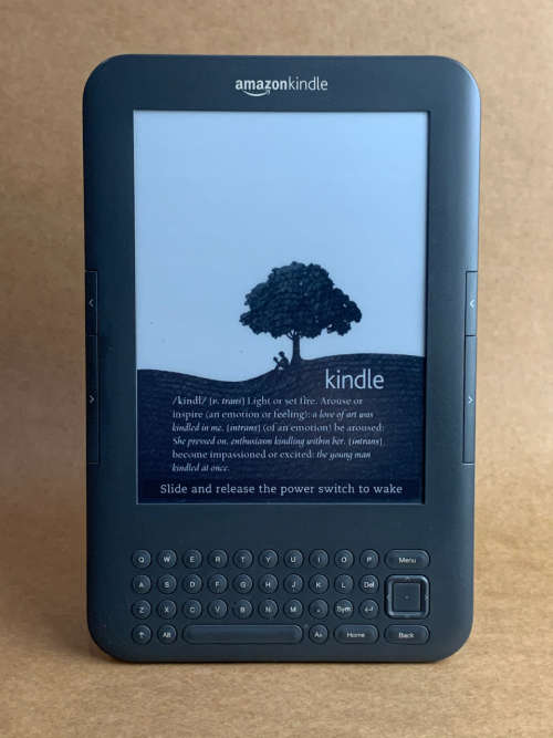 Kindle "Keyboard" Wi-Fi + 3G (3rd Generation) (Model D00901) + Cover with Built-in Reading Lamp