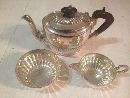 A silver plated small early tea set