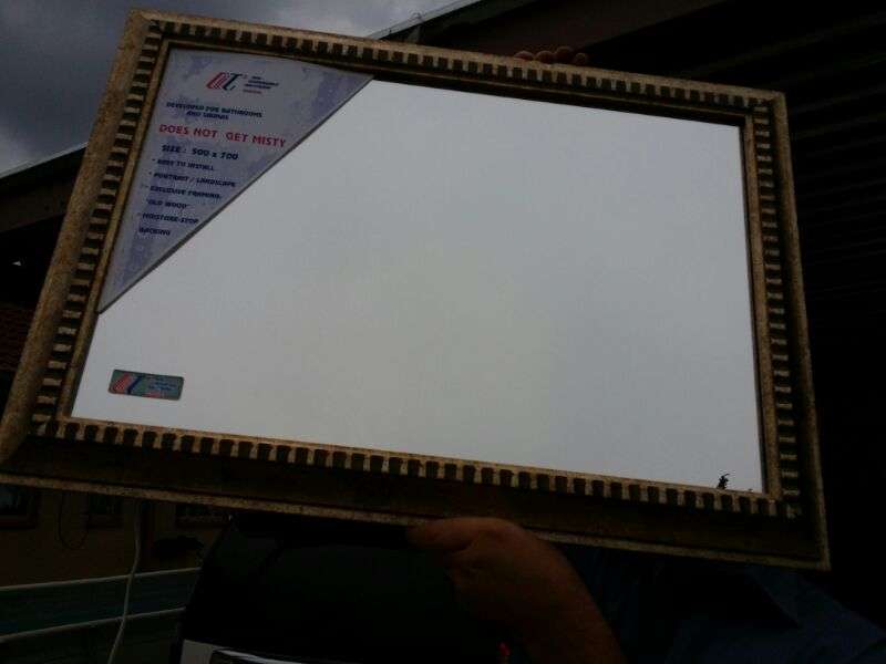 big beautiful bathroom mirror with build in anti fog 50 x 70 cm
