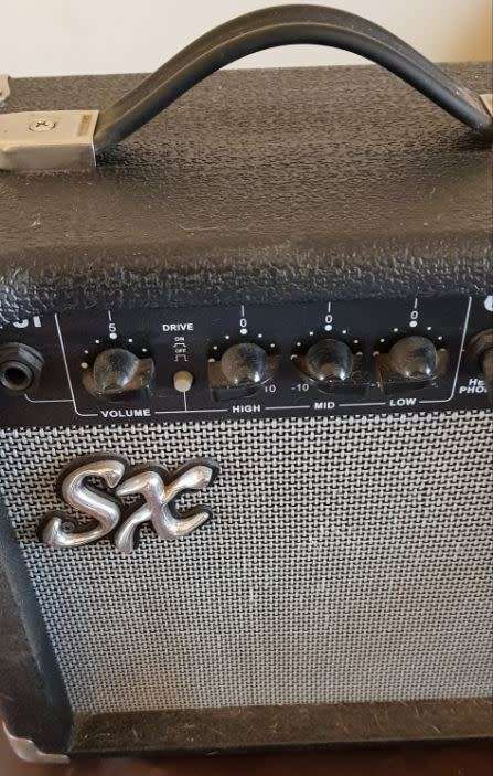 squier by fender 6 string electric guitar on auction