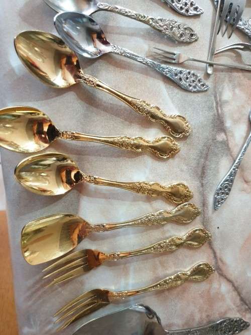 collection of spoons gold plated 24 carat etc - vintage read