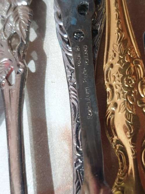 collection of spoons gold plated 24 carat etc - vintage read