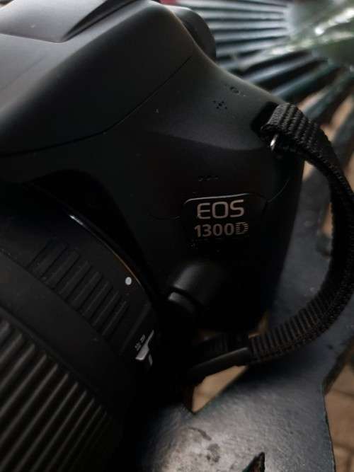 Very good condition rarely used canon 1300D with 18-55 mm lens, canon bag WIFI and more