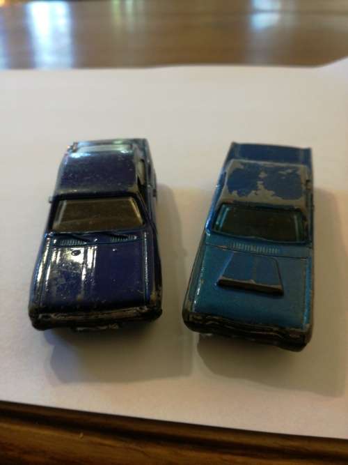 VINTAGE AMERICAN MUSCLE CARS. Chevrolet SS and 68 Dodge Dart.