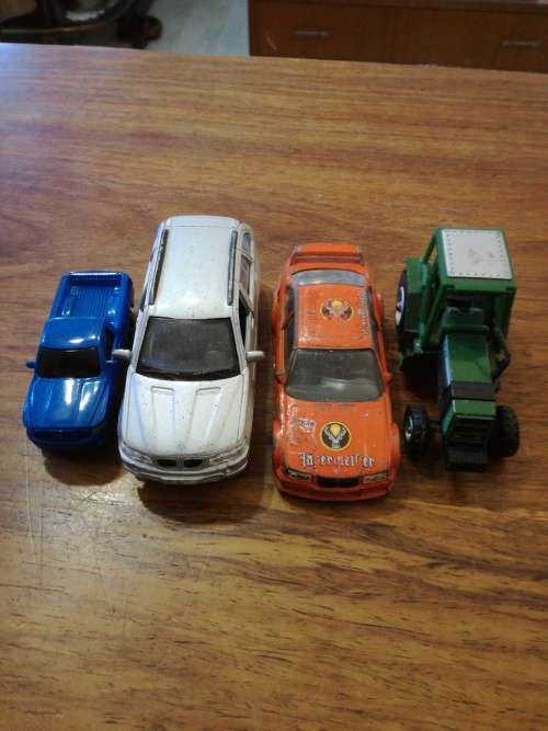 3 METAL MODEL CARS and a TRACTOR. one bid for ALL.