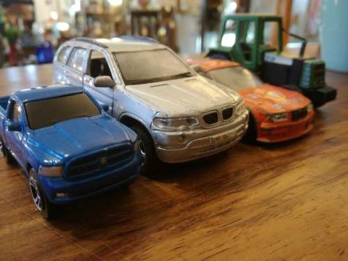 3 METAL MODEL CARS and a TRACTOR. one bid for ALL.