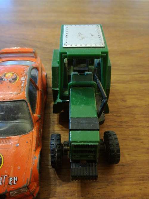 3 METAL MODEL CARS and a TRACTOR. one bid for ALL.