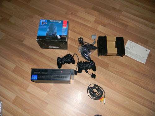 Playstation 2 FIRST RELEASE .With 3 remotes.Please read collection or courier only .
