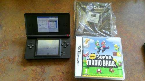 Nintendo DSLITE with Super Mario Bros Game .