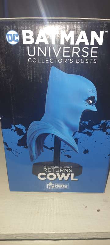 Batman Cowl with comic book.
