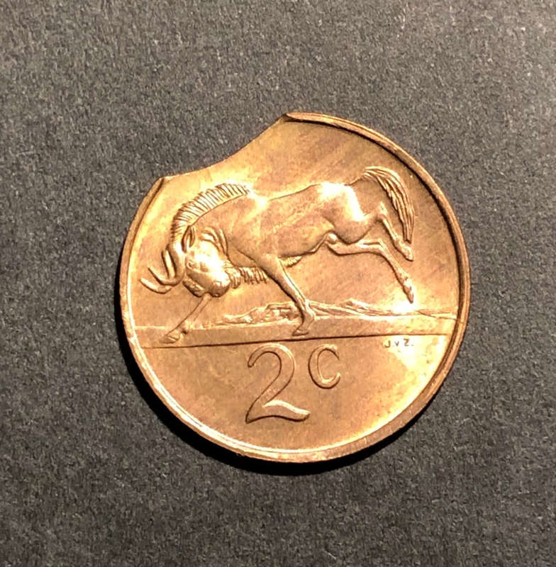 MAJOR MINT ERROR - CLIPPED PLANCHET - 1990 2c COIN!