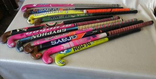 Huge bundle of brand name hockey sticks. One bid takes all!!