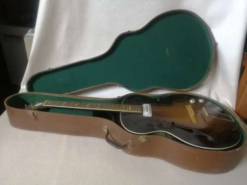 Beautiful antique Wizard electrical guitar in case for restoration