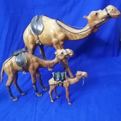 Awesome!! Group of Vintage Hand Carved Leather bound Camels