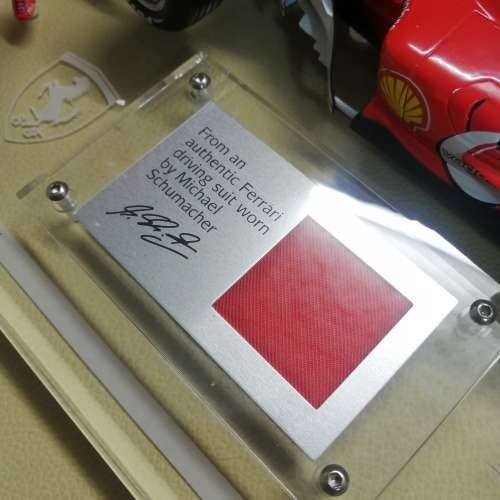 Certified Limited Michael Schumacher Ferrari F1 F2004 and Original Racing Suit Piece - Hot Wheels